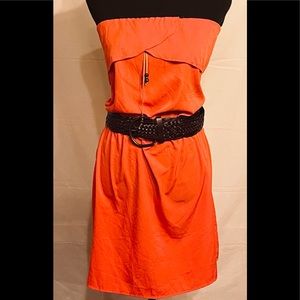 Strapless dress. Elastic waist. Leather beaded tassels.